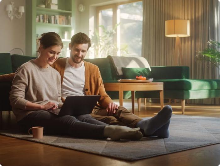 Couple looking at laptop